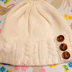 Cream beanie with buttons